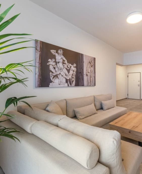 Modern Mythic Flat with Greek-Inspired Artistic